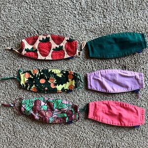 Six BAGGU cloth masks, assorted colors and patterns